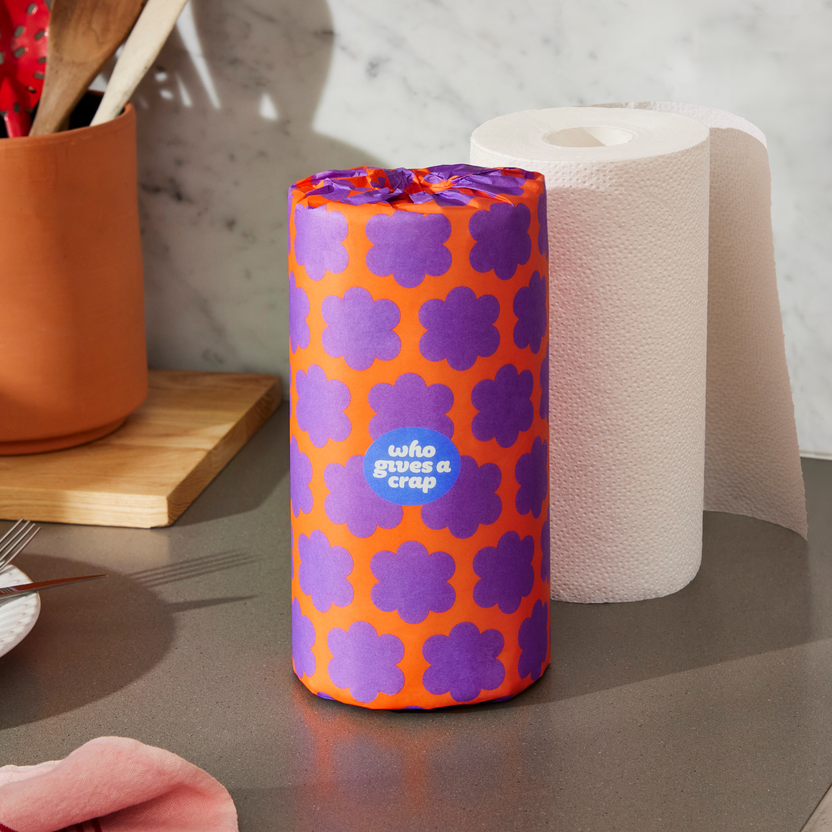 Single roll of Who Gives a Crap paper towel on kitchen bench Single roll of Who Gives a Crap paper towel on kitchen bench