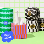 Bundle of Who Gives a Crap products with bamboo toilet paper, paper towel and tissues against green and white background. Caption in corner calls out that it is ‘Best value’.