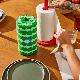 Two rolls of Who Gives a Crap paper towel on kitchen bench